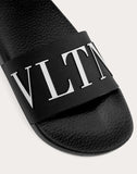 WOMEN'S VALENTINO GARAVANI VLTN RUBBER SLIDE SANDAL BLACK