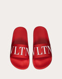 WOMEN'S VALENTINO GARAVANI VLTN RUBBER SLIDE SANDAL RED