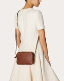 WOMEN'S VALENTINO GARAVANI SMALL ROCKSTUD GRAINY CALFSKIN CROSSBODY BAG BROWN