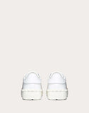 WOMEN'S VALENTINO GARAVANI OPEN SNEAKER WITH METALLIC STRIPE GOLD