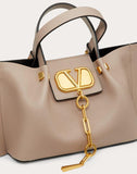 WOMEN'S VALENTINO GARAVANI SMALL VLOGO ESCAPE GRAINY CALFSKIN SHOPPER POUDRE